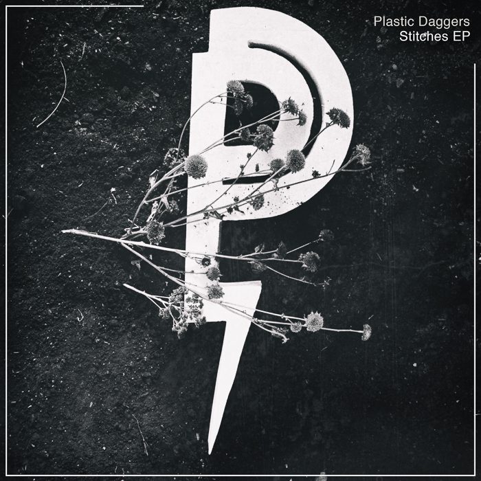 Stylized letter P with dried flowers.