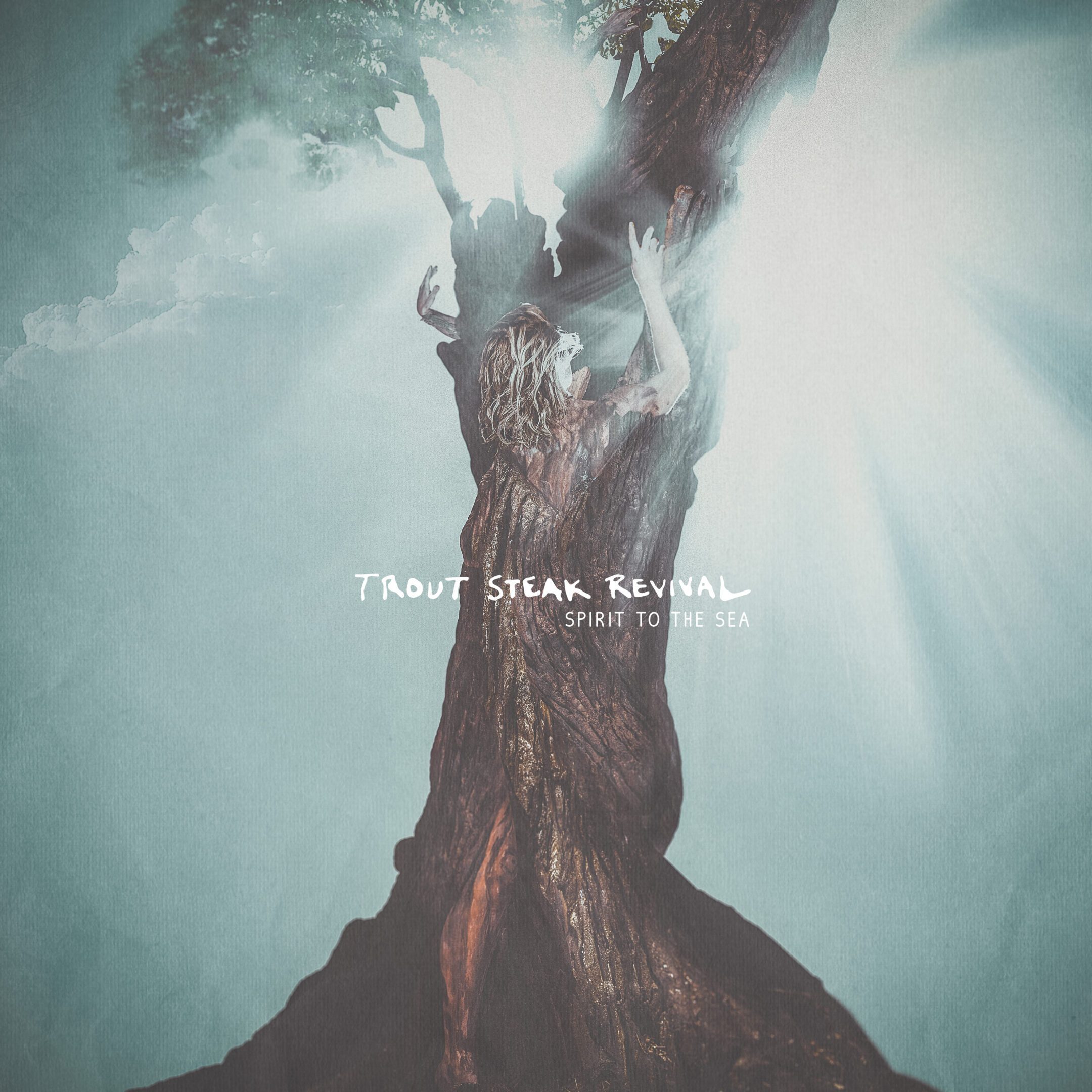Person merging with tree in sunlight.