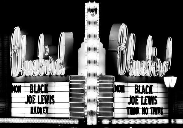 Bluebird theater marquee with event listings.
