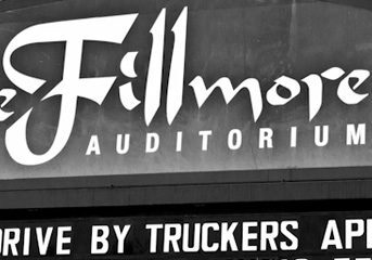 Fillmore Auditorium sign with event details.