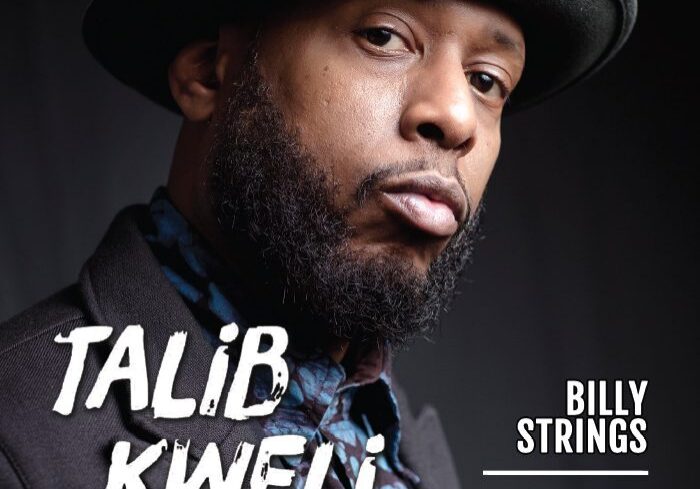 Magazine cover featuring a man in hat.