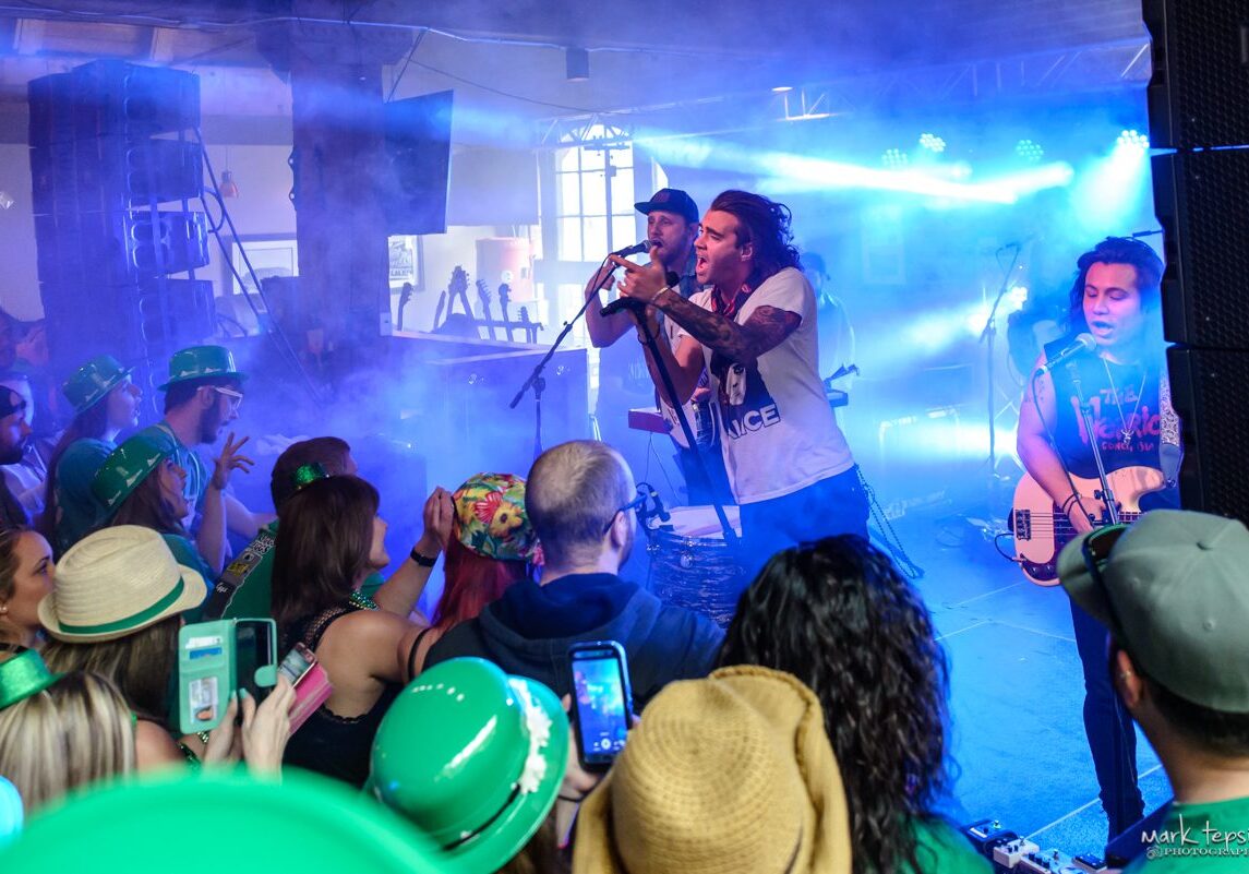 Band performing live at a festive event.