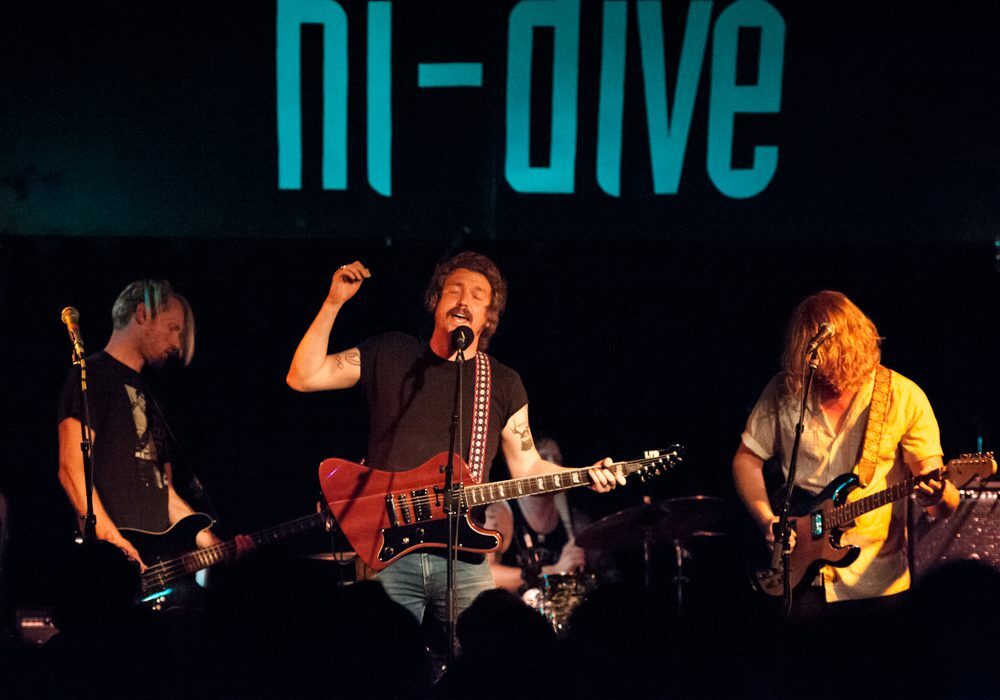 Band performing live at Hi-Dive venue.