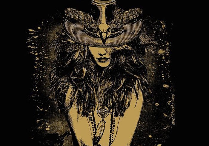 Woman in ornate hat with text overlay.