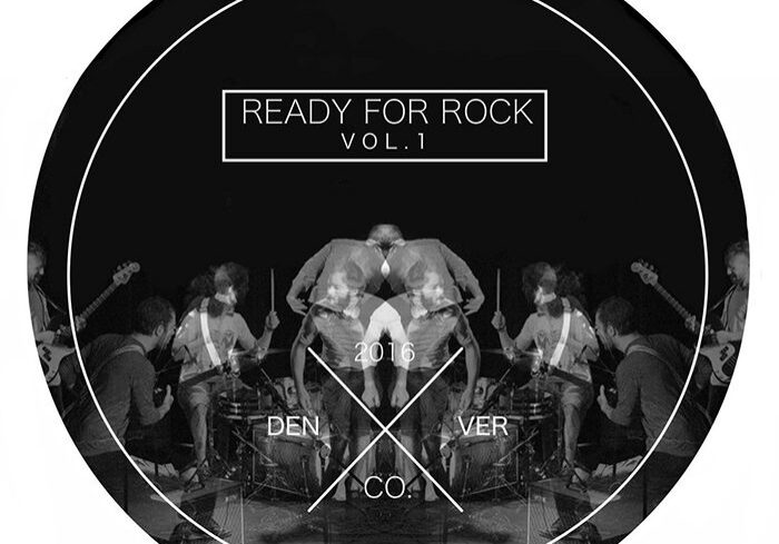 Rock concert poster with mirrored band image.