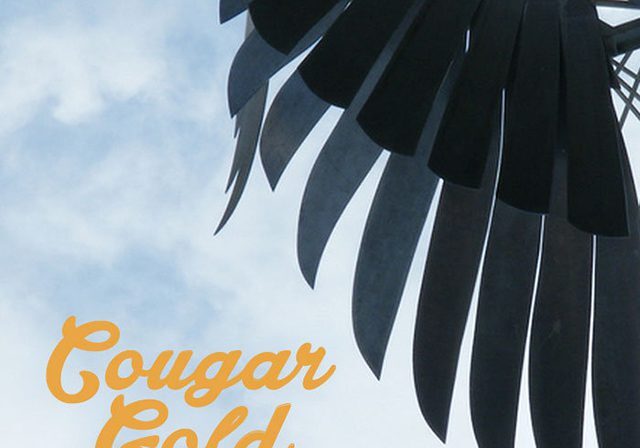 Palm leaves with "Cougar Gold" text overlay.