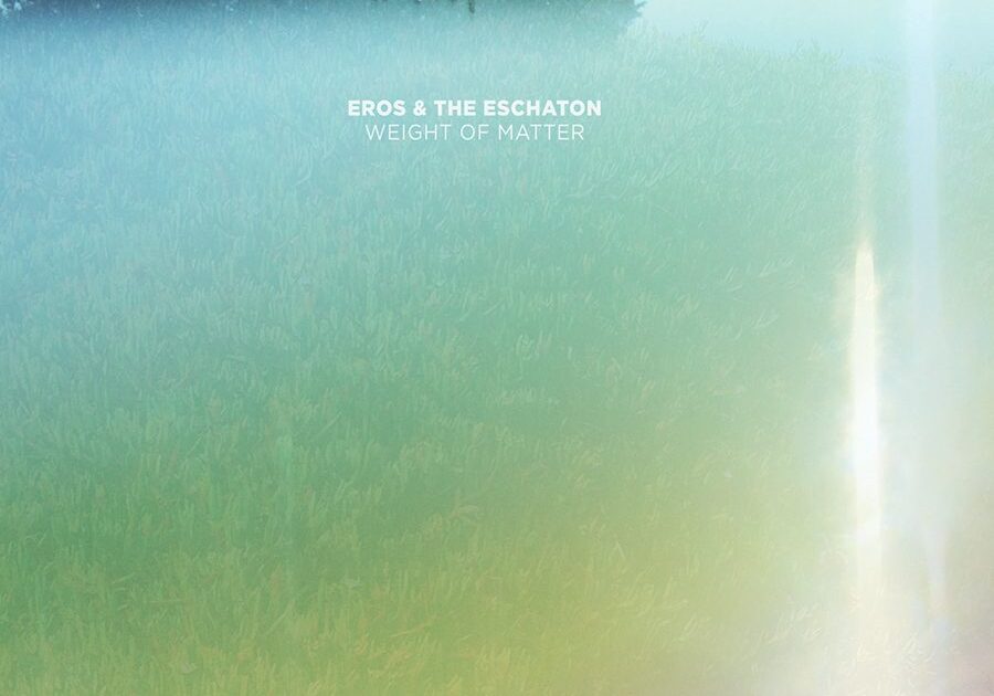 Album cover with misty field and text.