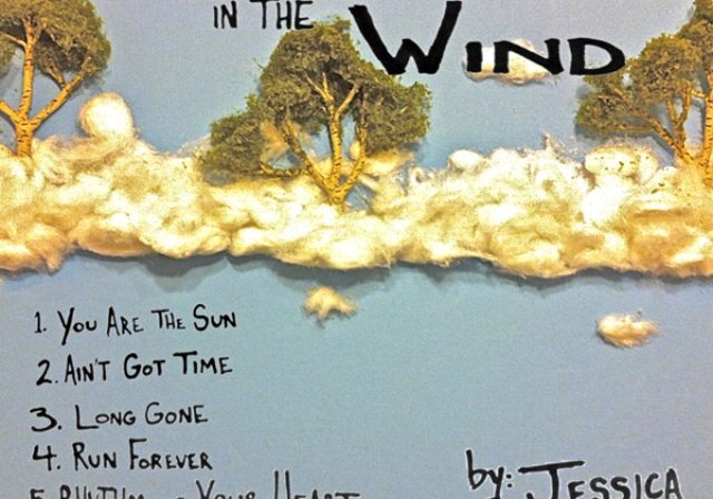 Album cover with trees and cloud art.