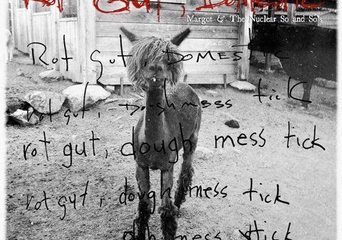 Dog in front of rustic building, handwritten text.