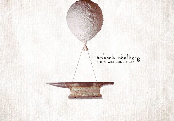 Balloon lifting an anvil on textured background.