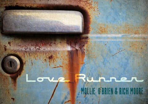 Rusty car door with "Love Runner" text.