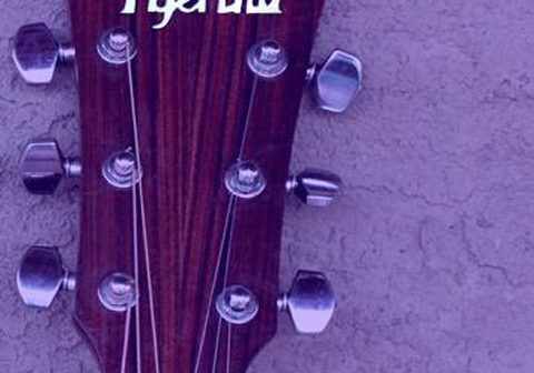 Guitar headstock with "Tijerina" and "meant to be.