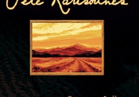 Album cover with landscape and handwritten text.