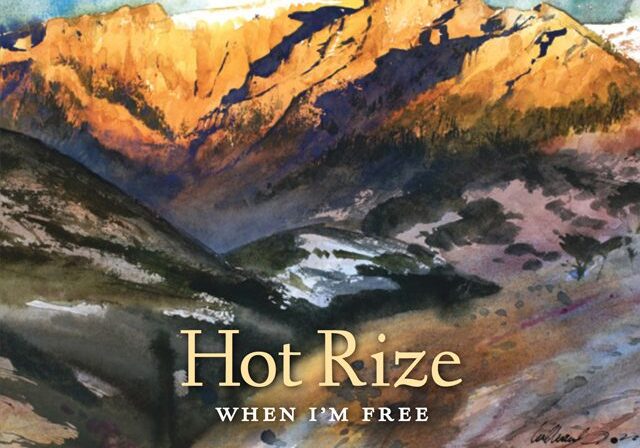 Mountain landscape with "Hot Rize" album cover.