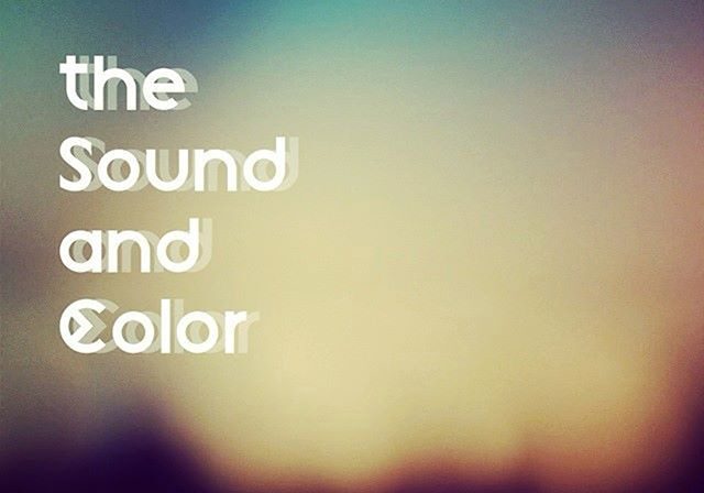 Blurry background with text "Sound and Color".