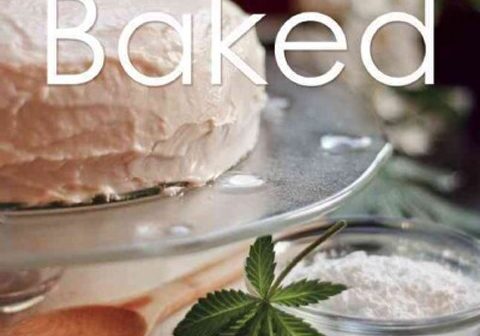 Cake with cannabis leaf and powder.