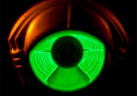 Glowing green and orange abstract design.