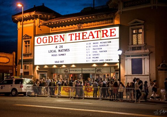 Crowd outside Ogden Theatre at night.