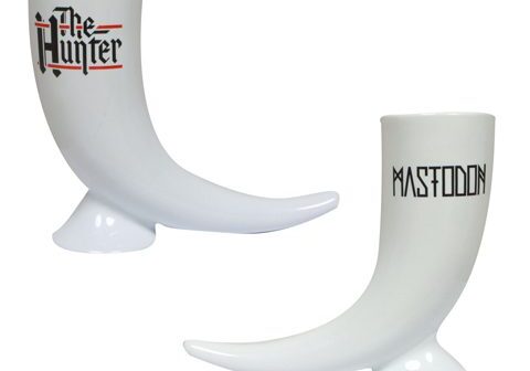 Ceramic horn mugs with band logos.