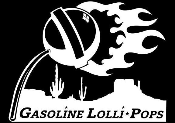 Flaming lollipop with desert landscape silhouette.