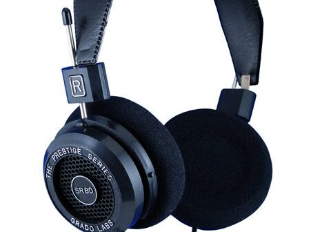 Black over-ear wired headphones with padded headband.