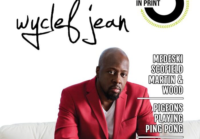 Magazine cover featuring a person in red.