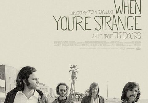 When You're Strange" film poster featuring band.