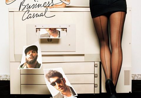 Woman at copier with printed photos.