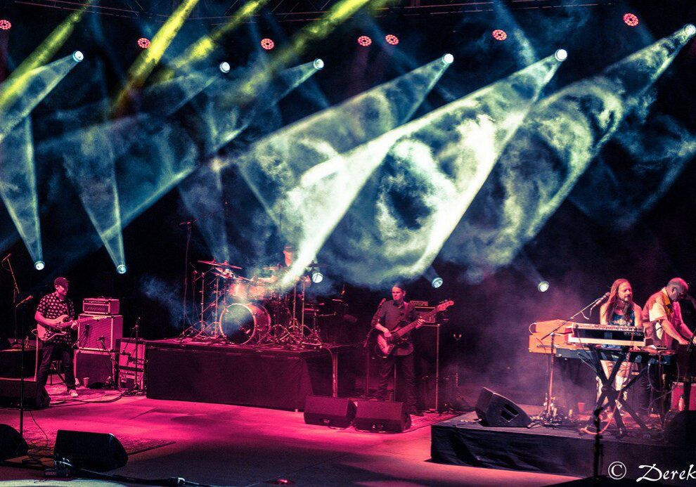 Concert stage with colorful lighting effects.