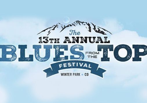Blues festival logo with mountain background.