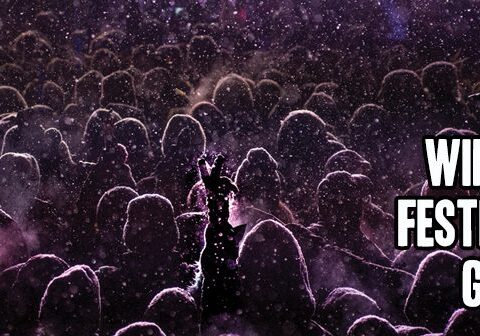 Crowd at snowy winter festival event.