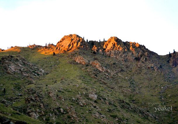 Rocky mountain landscape at sunset.