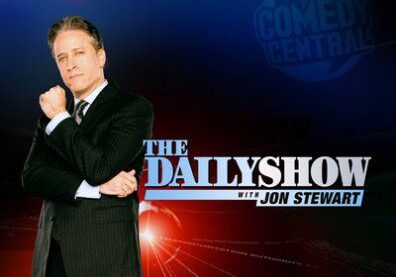 TV show host with "The Daily Show" logo.