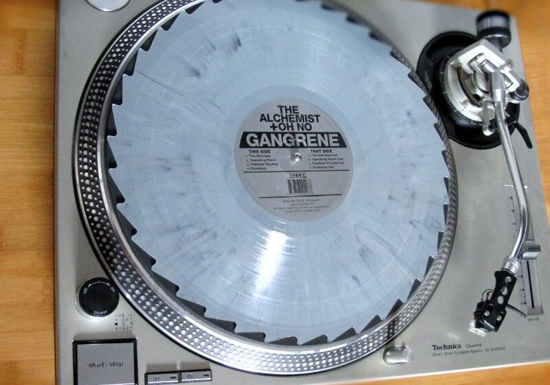 Turntable with Gangrene record on platter.