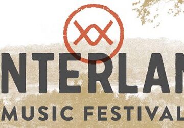 Hinterland Music Festival logo with trees.