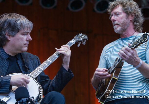 Two musicians playing banjo and mandolin.