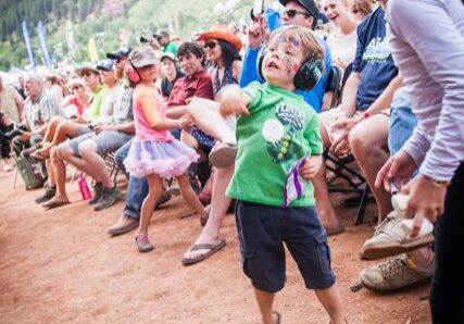 Children enjoying an outdoor event together.