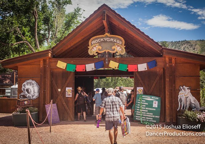 Entrance to RockyGrass festival with visitors entering.
