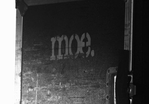 Black equipment case with "moe." logo.