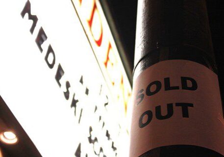 Sold out sign on a pole.