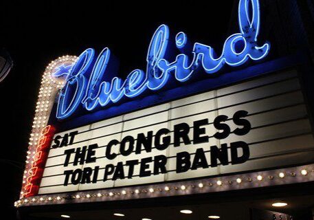 Bluebird Theater marquee with band names displayed.