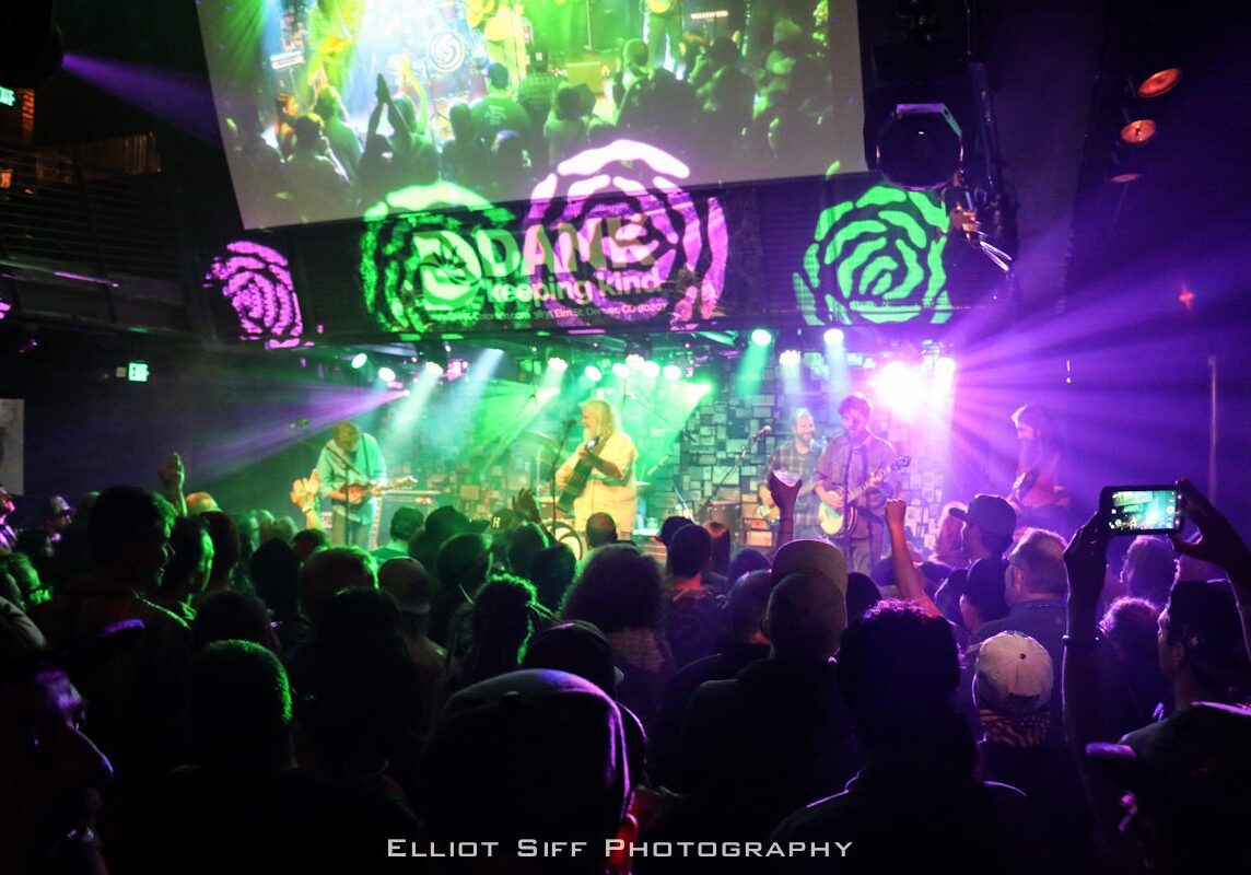 Live band performing at a vibrant concert.
