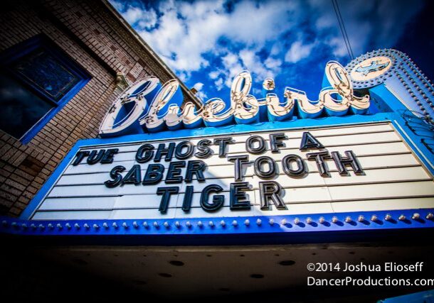 Bluebird Theater marquee with show title.
