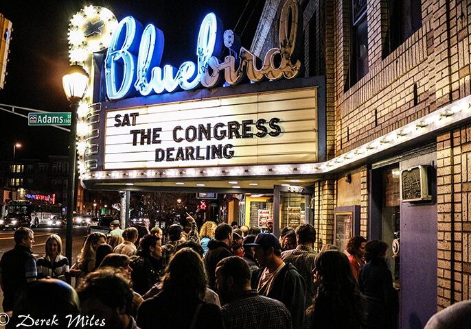 Crowd outside Bluebird Theater at night.