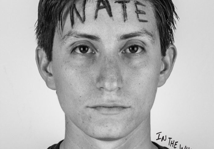 Person with "Nate" written on forehead.