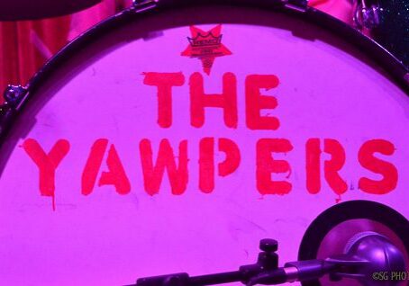 Drum with "The Yawpers" in red text.