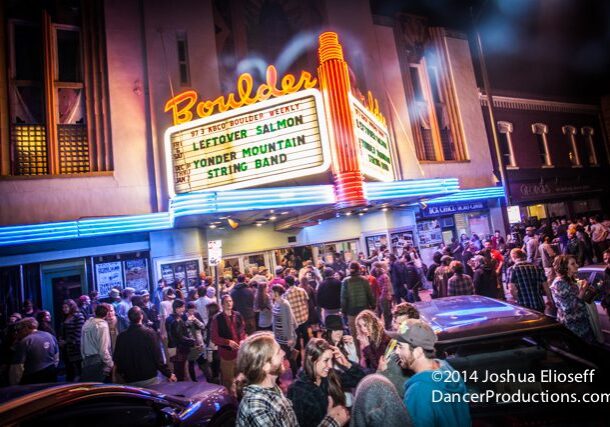 Crowd outside Boulder Theater at night.
