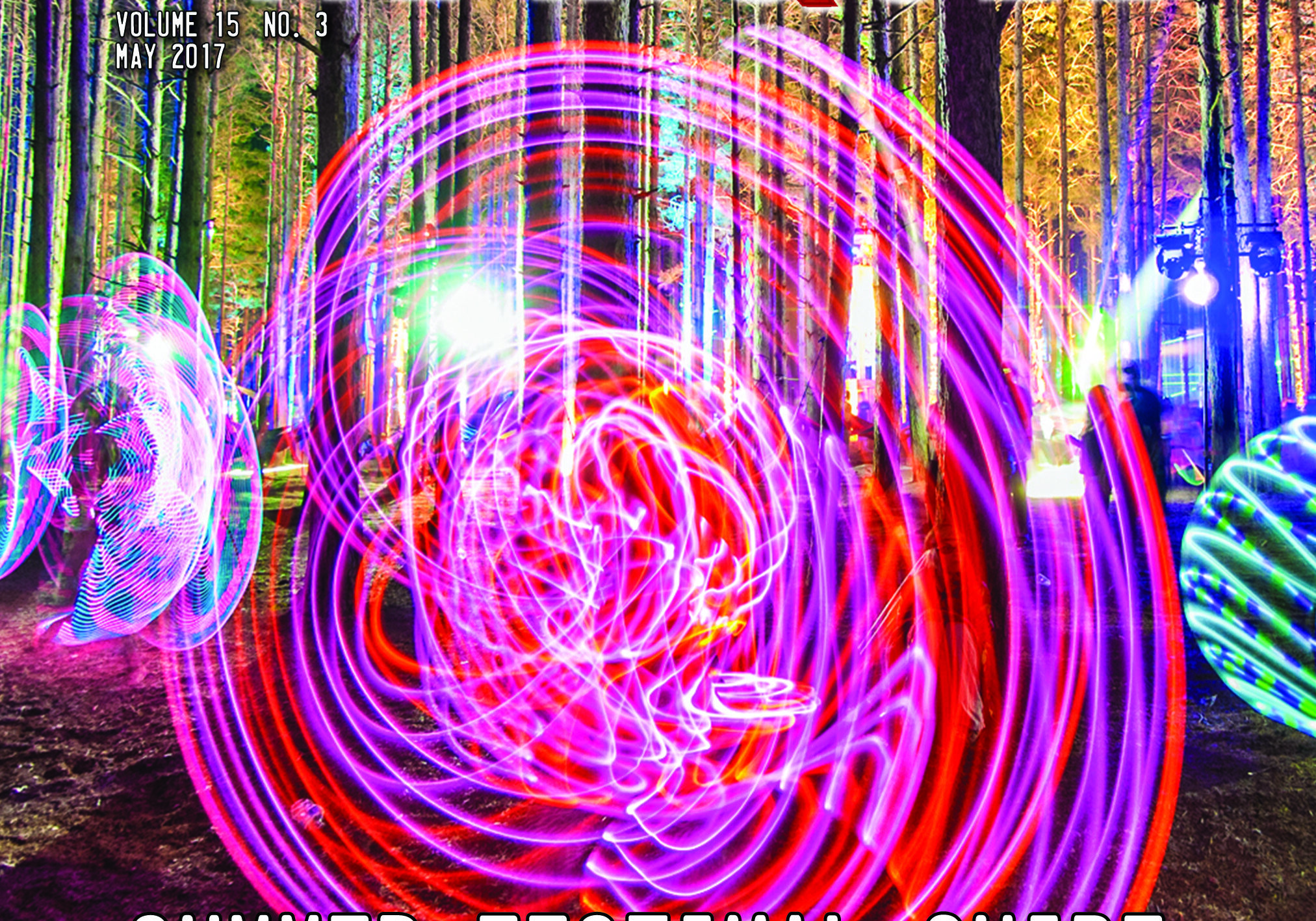 Colorful lights in a forest, festival guide.