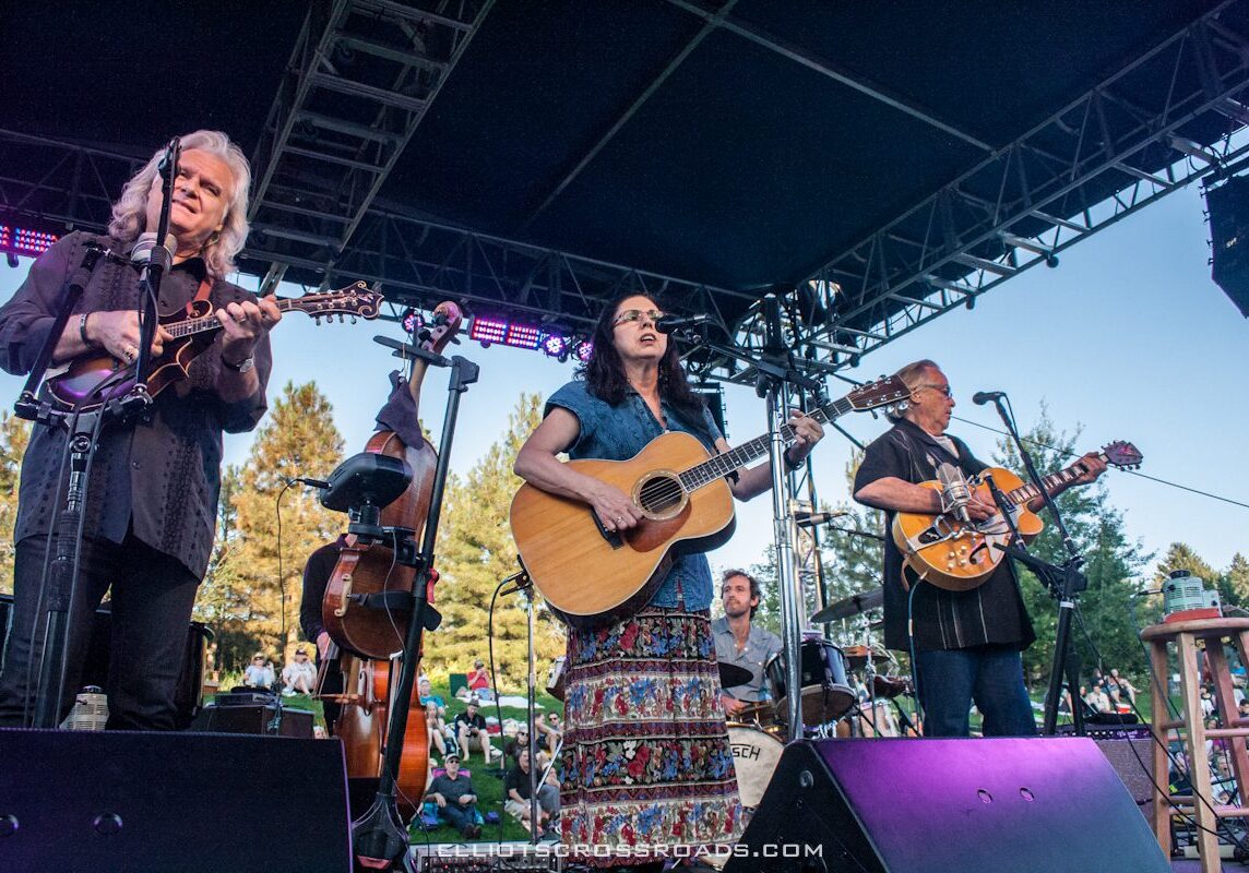 Band performing live at outdoor music festival.