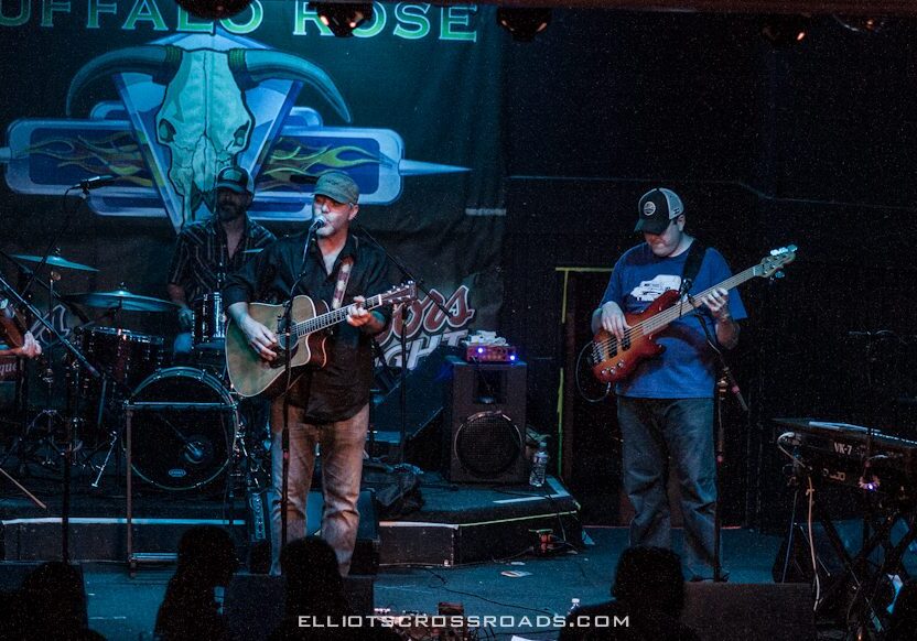 Band performing on stage at Buffalo Rose.